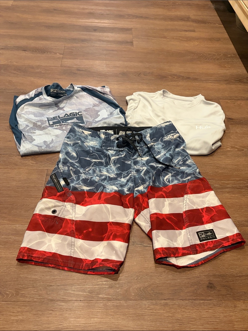 Pelagic American Flag Board Shorts & shirts
